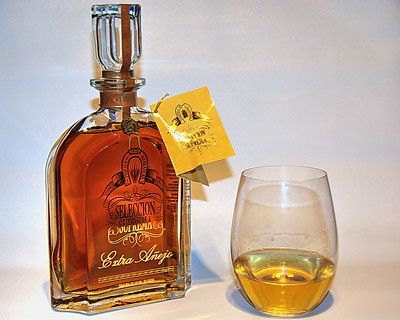 Tequila bottle and glass extra añejo