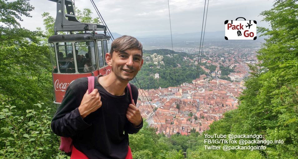 Tampa Mountain view, cable car and man. Brasov, Romania.