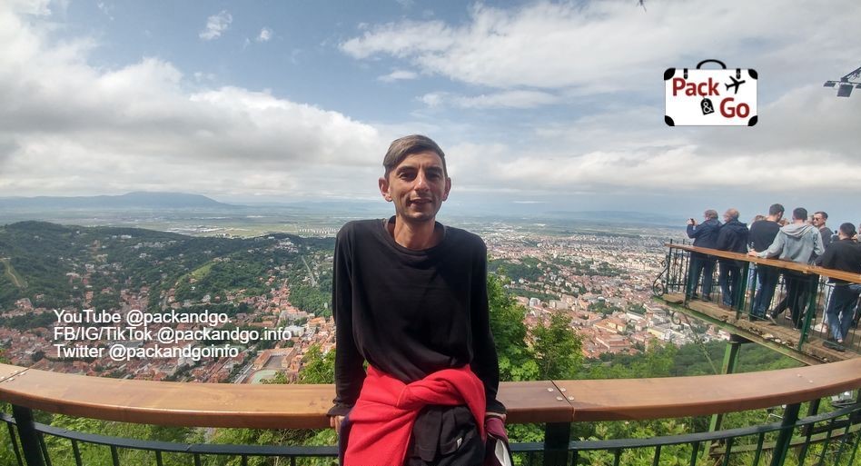 Man in the view point terrace at the top of Tampa mountain, Brasov, Romania.